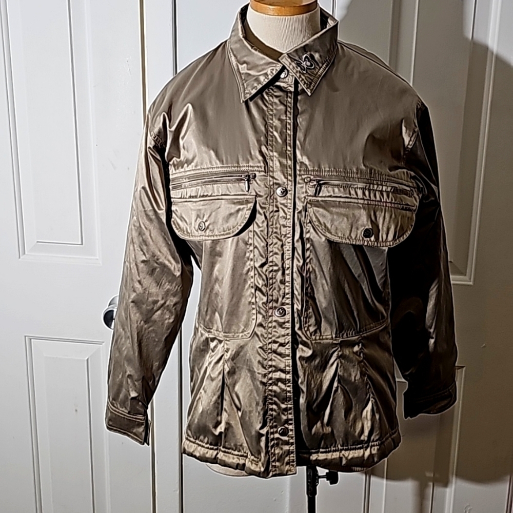 Cold as Ice women's jacket. Size small. Lots of pockets. Excellent shinny fabric